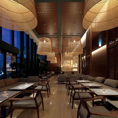 Candeo Hotels Osaka The Tower Bagian luar foto The lounge at the airport