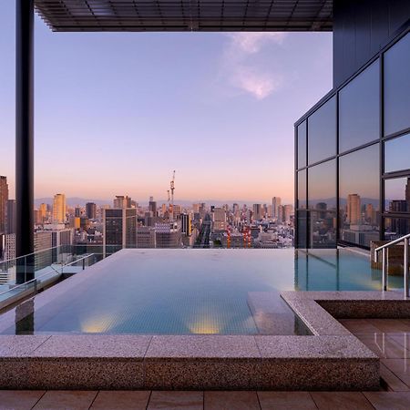 Candeo Hotels Osaka The Tower Bagian luar foto A rooftop onsen in Tokyo