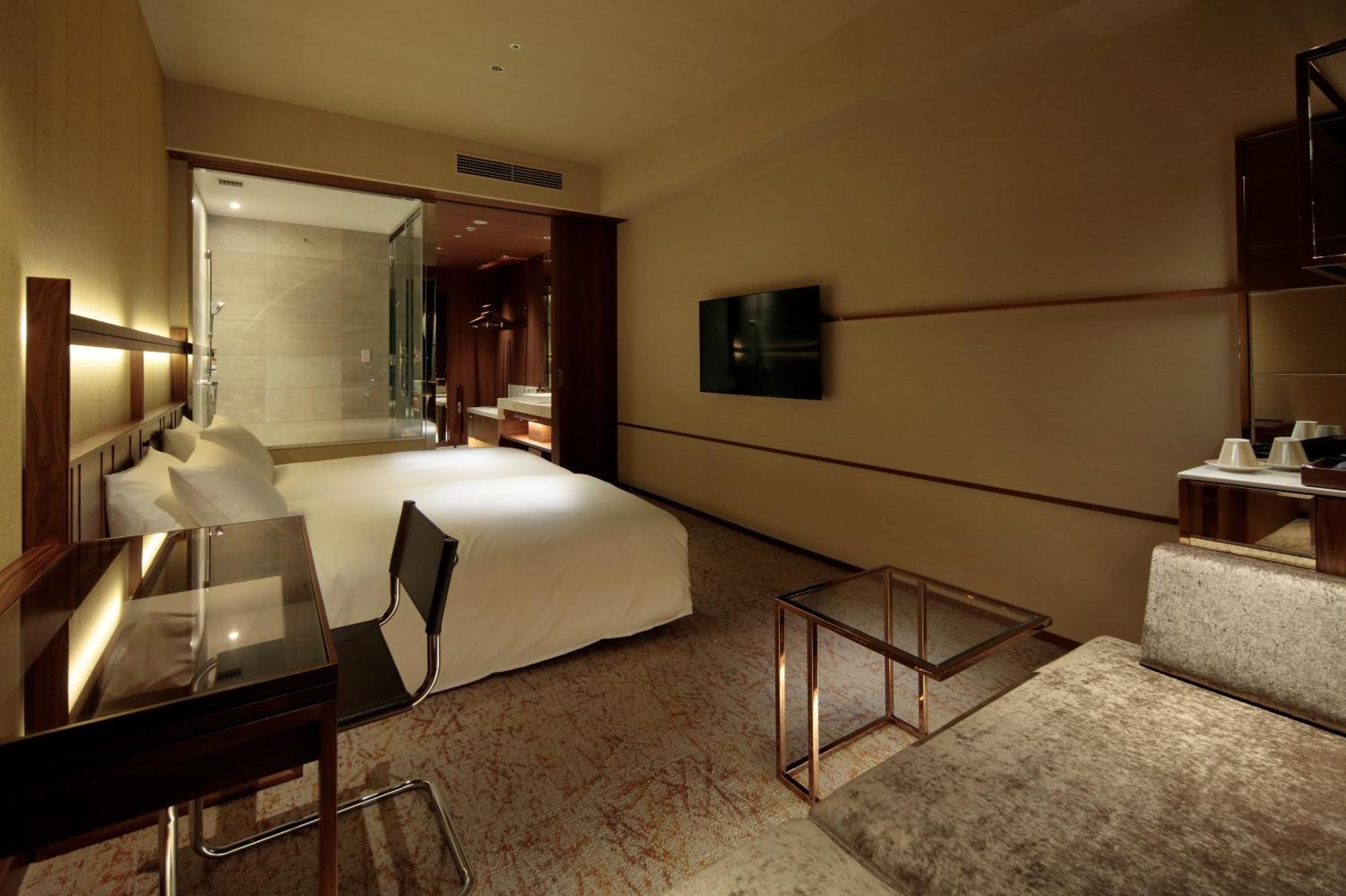 Candeo Hotels Osaka The Tower Ruang foto A room at the hotel