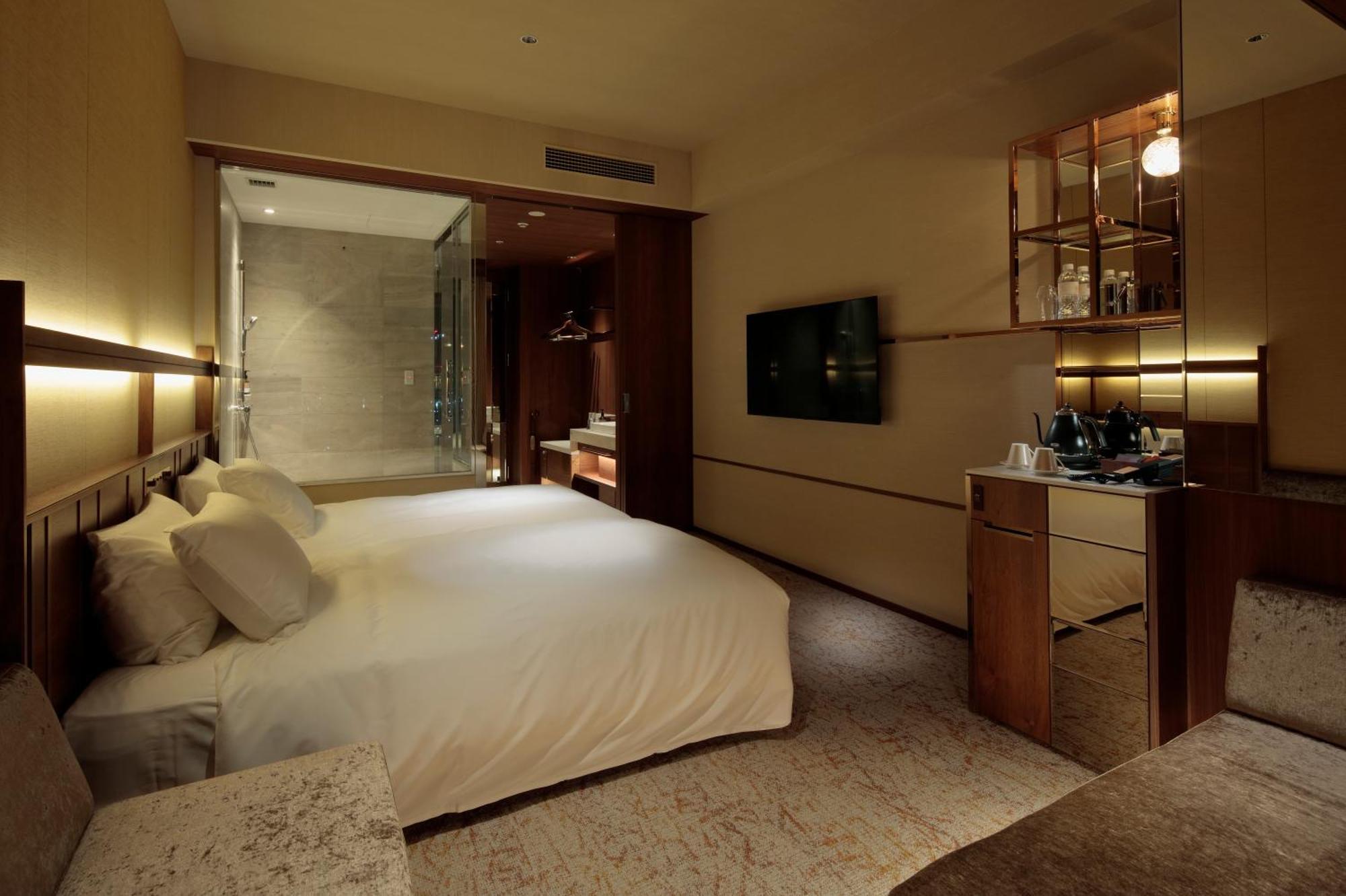 Candeo Hotels Osaka The Tower Ruang foto A room at the hotel